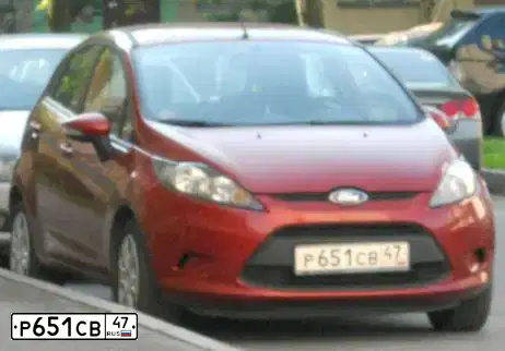 Фото автомобиля FORD FIESTA, 2009 — госномер Е140РС147. Цвет: КРАСНО-ОРАНЖЕВЫЙ