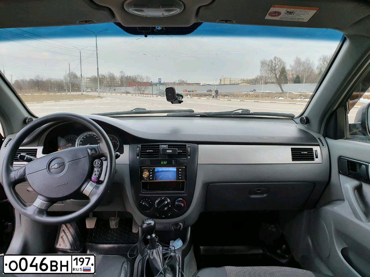 Фото автомобиля CHEVROLET LACETTI, 2010 — госномер М624ОО21. Цвет: ЧЕРНЫЙ