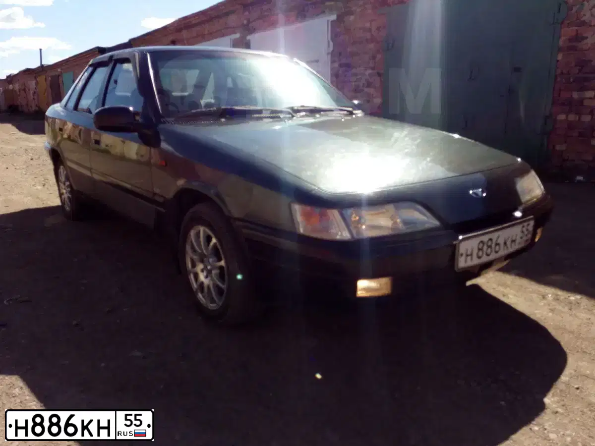Фото автомобиля DAEWOO ESPERO, 1997 — госномер У267НН72. Цвет: СЕРЫЙ