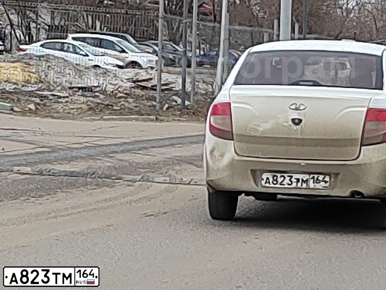 Фото автомобиля LADA 2190 GRANTA, 2014 — госномер А823ТМ164. Цвет: Белый
