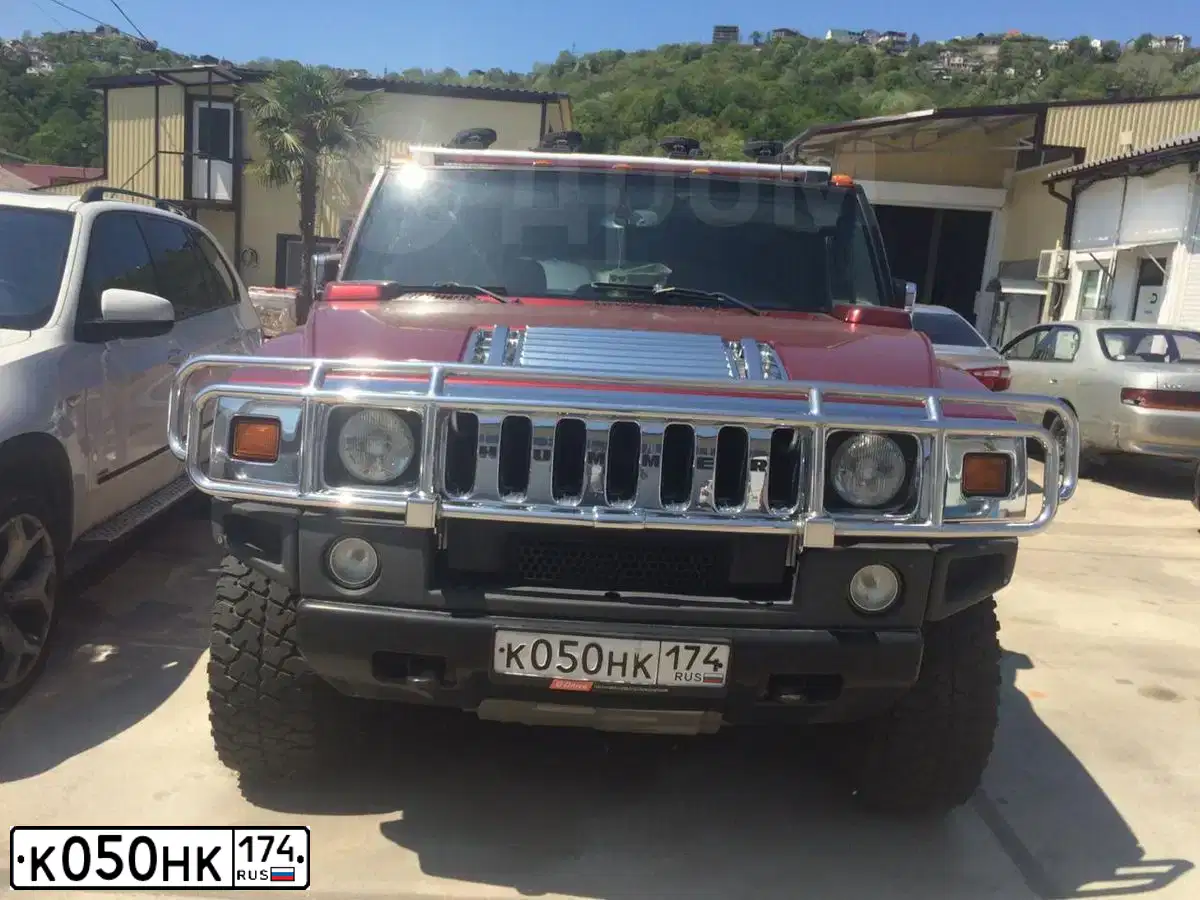 Фото автомобиля HUMMER H2, 2005 — госномер М763НК65. Цвет: ТЕМНО-КРАСНЫЙ