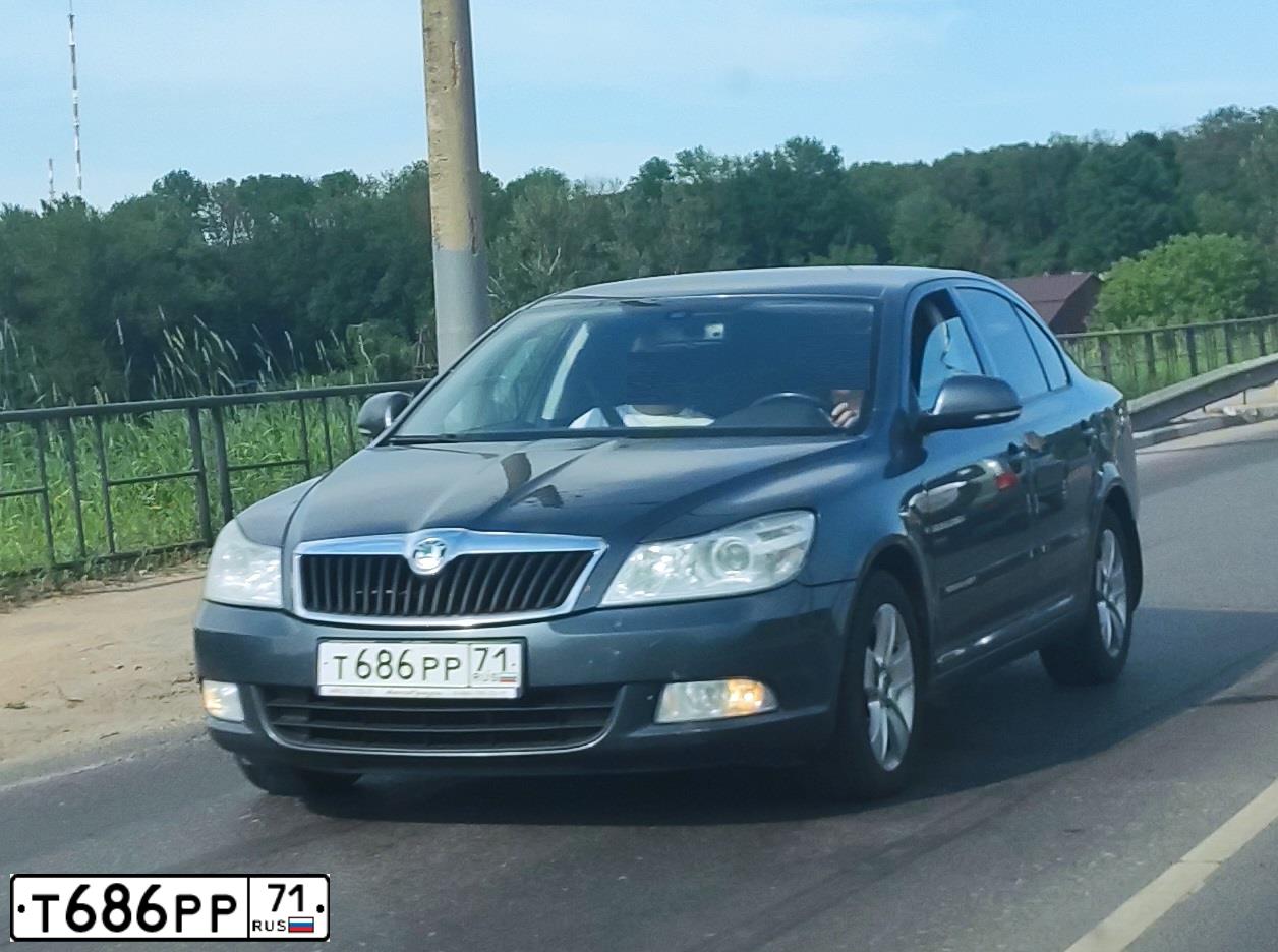 Фото автомобиля SKODA OCTAVIA, 2012 — госномер Т686РР71. Цвет: СЕРЫЙ ТЕМНЫЙ