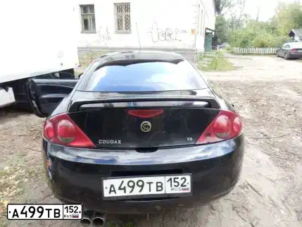 Фото автомобиля MERCURY COUGAR, 1999 — госномер У125СР52. Цвет: ЧЕРНЫЙ