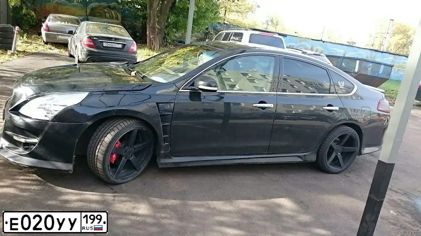 Фото автомобиля MITSUBISHI LANCER, 2008 — госномер С336СХ77. Цвет: СЕРЫЙ