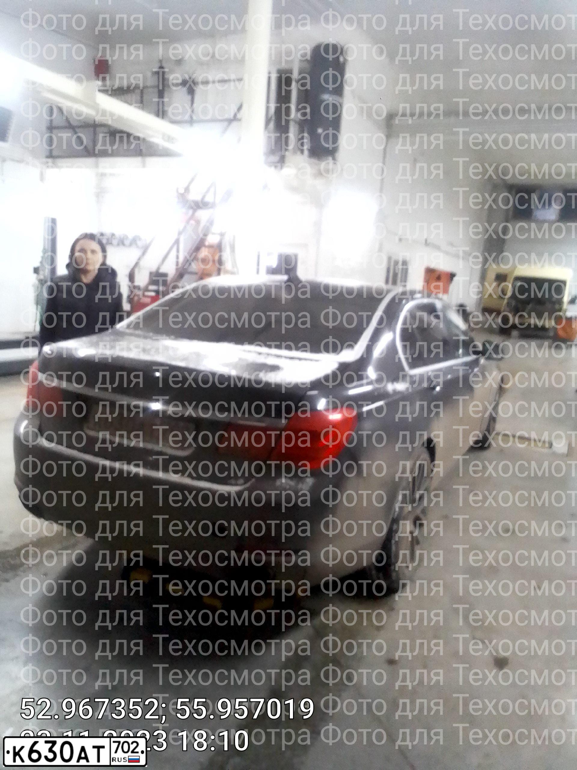 Фото автомобиля BMW 750, 2008 — госномер М243ТН702. Цвет: ЧЕРНЫЙ