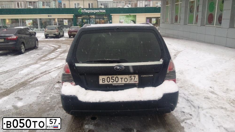 Фото автомобиля SUBARU FORESTER, 2005 — госномер Н585АХ32. Цвет: ЧЕРНЫЙ