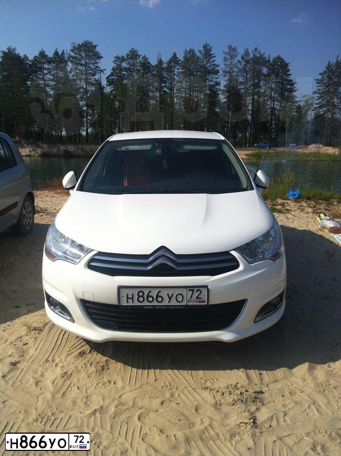 Фото автомобиля CITROEN C4, 2011 — госномер Н866УО72. Цвет: БЕЛЫЙ