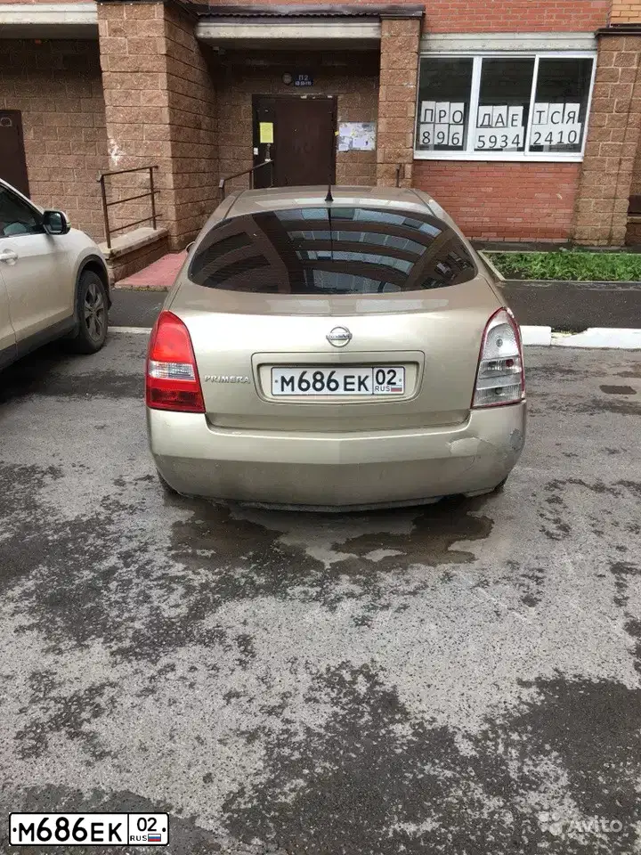 Фото автомобиля NISSAN PRIMERA, 2002 — госномер М686ЕК02. Цвет: ЖЕЛТЫЙ (ЗОЛОТИСТЫЙ)