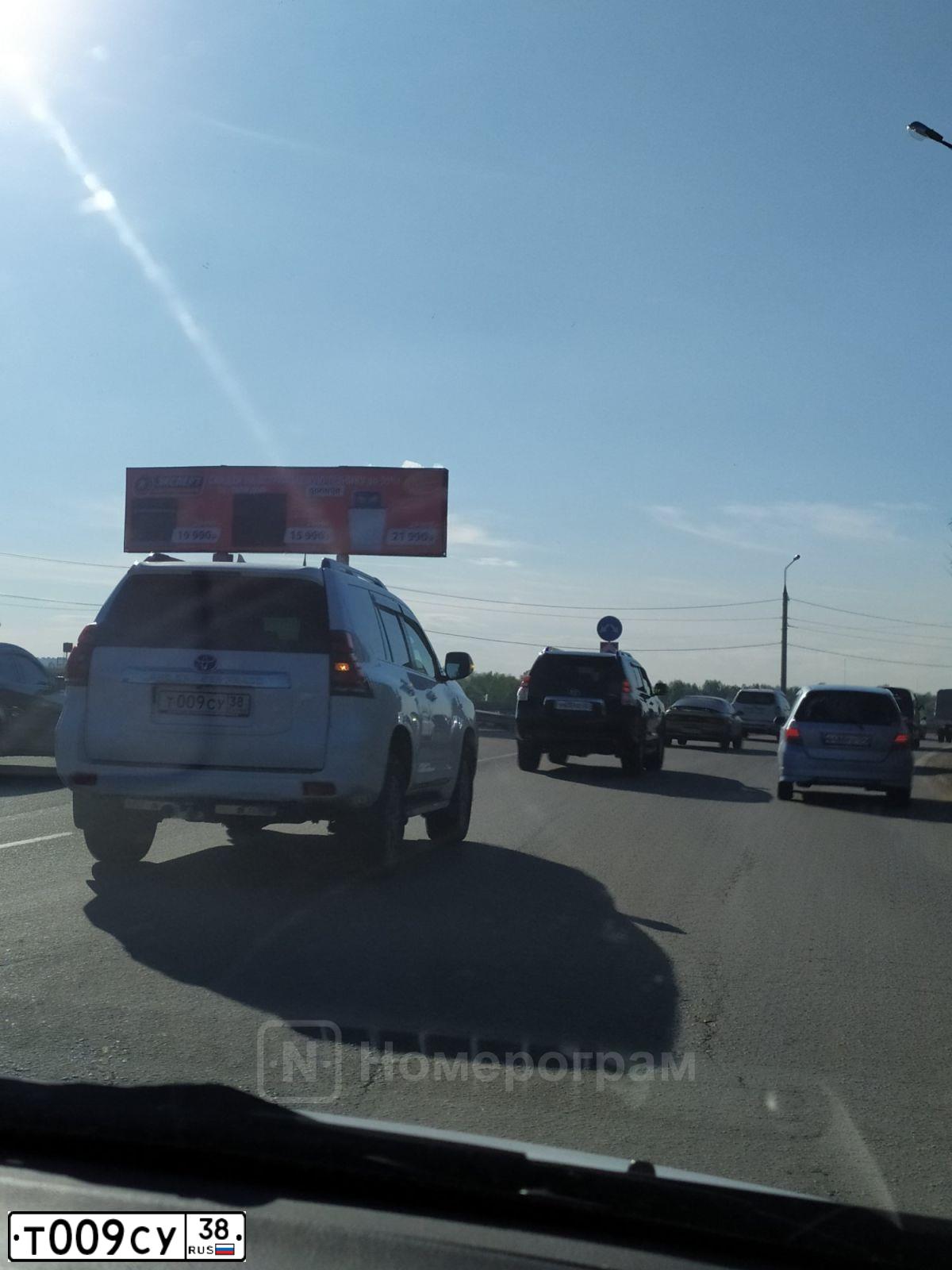 Фото автомобиля TOYOTA AVENSIS, 2006 — госномер О400КВ138. Цвет: СВЕТЛО-ОЛИВКОВЫЙ