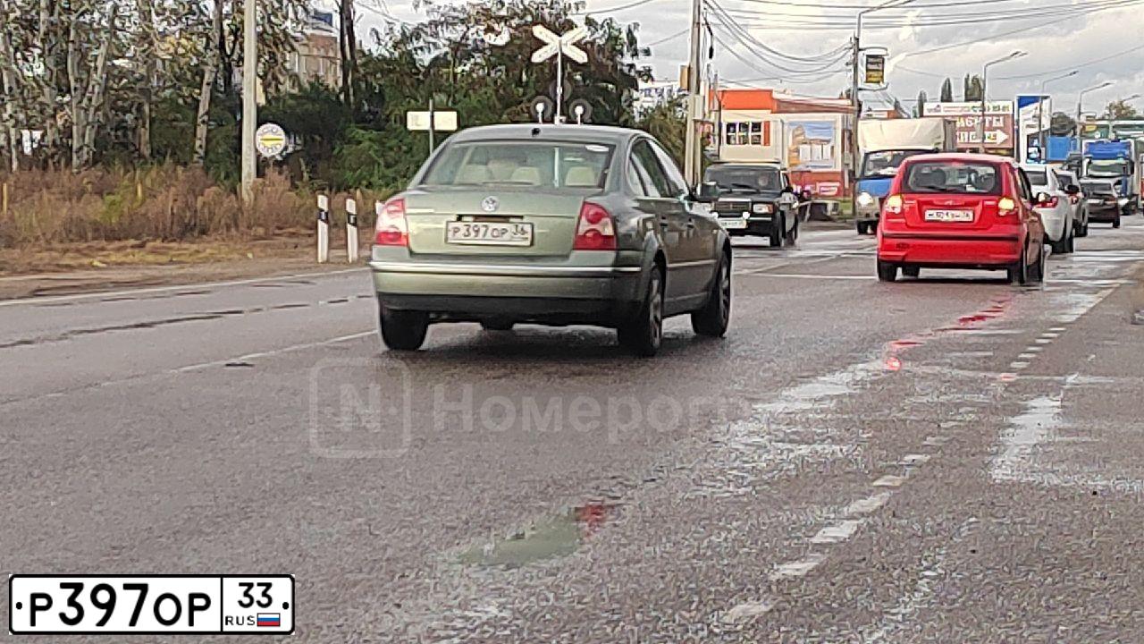 Фото автомобиля LADA 2112 LADA, 2007 — госномер В181ОУ252. Цвет: Темно-зеленый