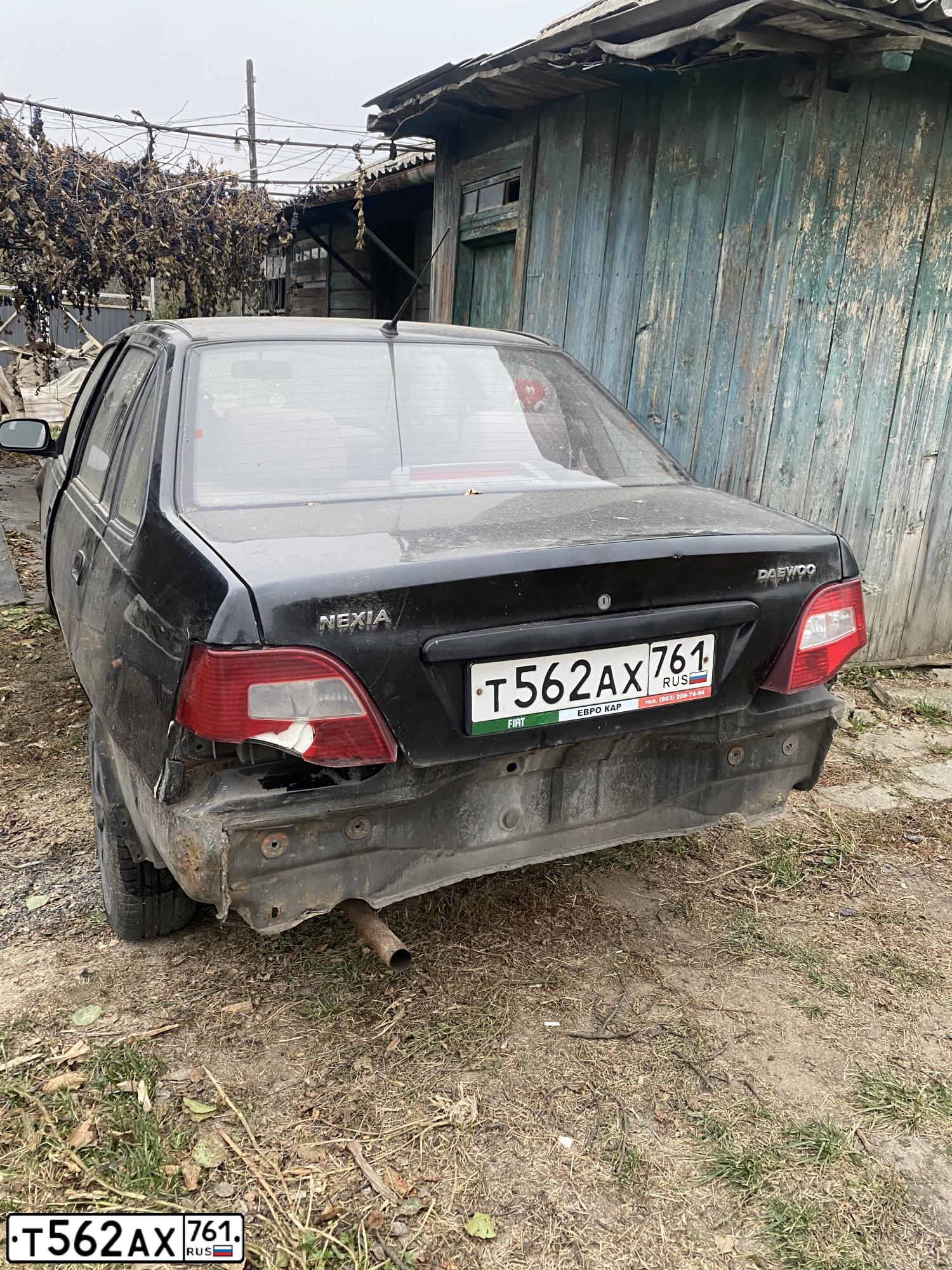 Фото автомобиля DAEWOO NEXIA, 2009 — госномер Т507ЕС161. Цвет: КОРАЛЛОВО-ЧЕРНЫЙ