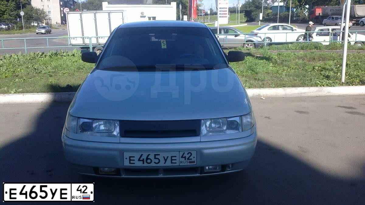 Фото автомобиля LADA 2112, 2004 — госномер Е465УЕ42. Цвет: МОЛОЧНО-БЕЛЫЙ СЕРЕБРИСТЫЙ