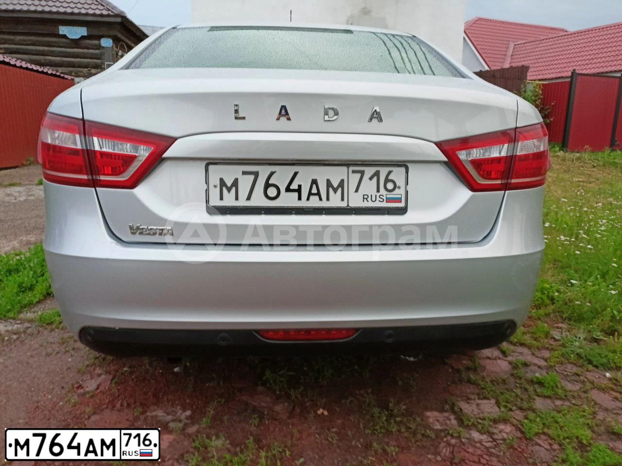 Фото автомобиля LADA VESTA, 2019 — госномер М764АМ716. Цвет: СЕРЫЙ