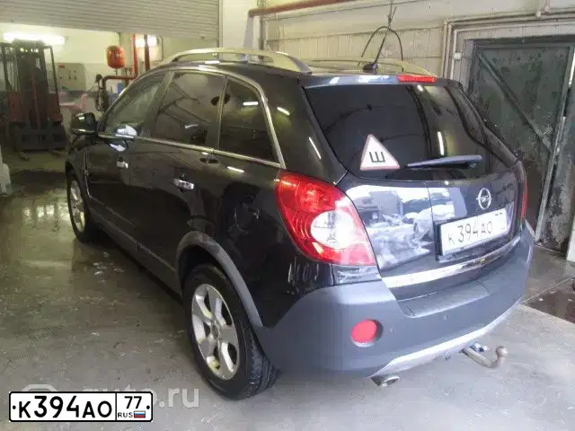Фото автомобиля OPEL ANTARA, 2009 — госномер Е815ВХ82. Цвет: ЧЕРНЫЙ