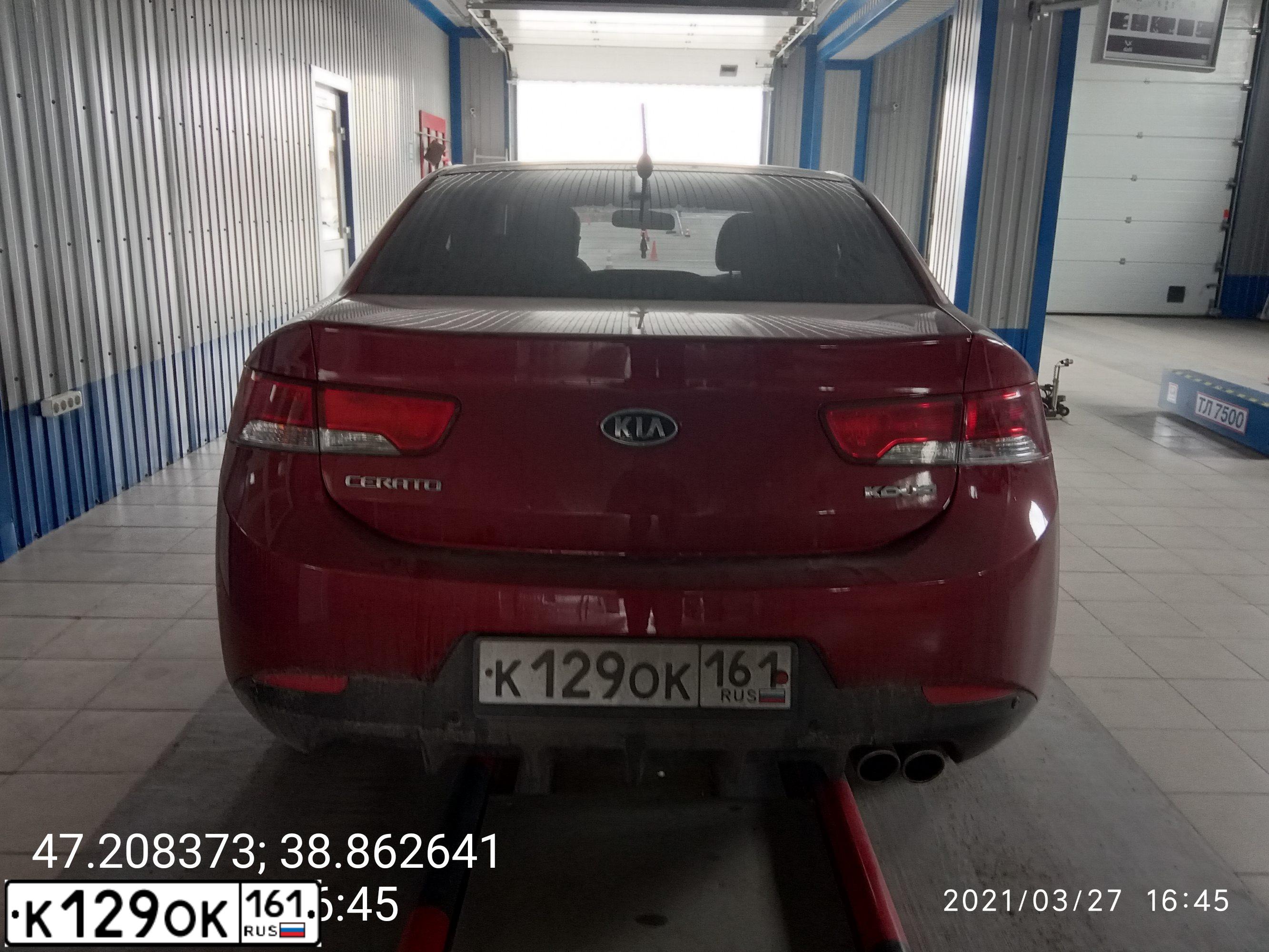 Фото автомобиля KIA CERATO, 2011 — госномер К129ОК161. Цвет: Красный