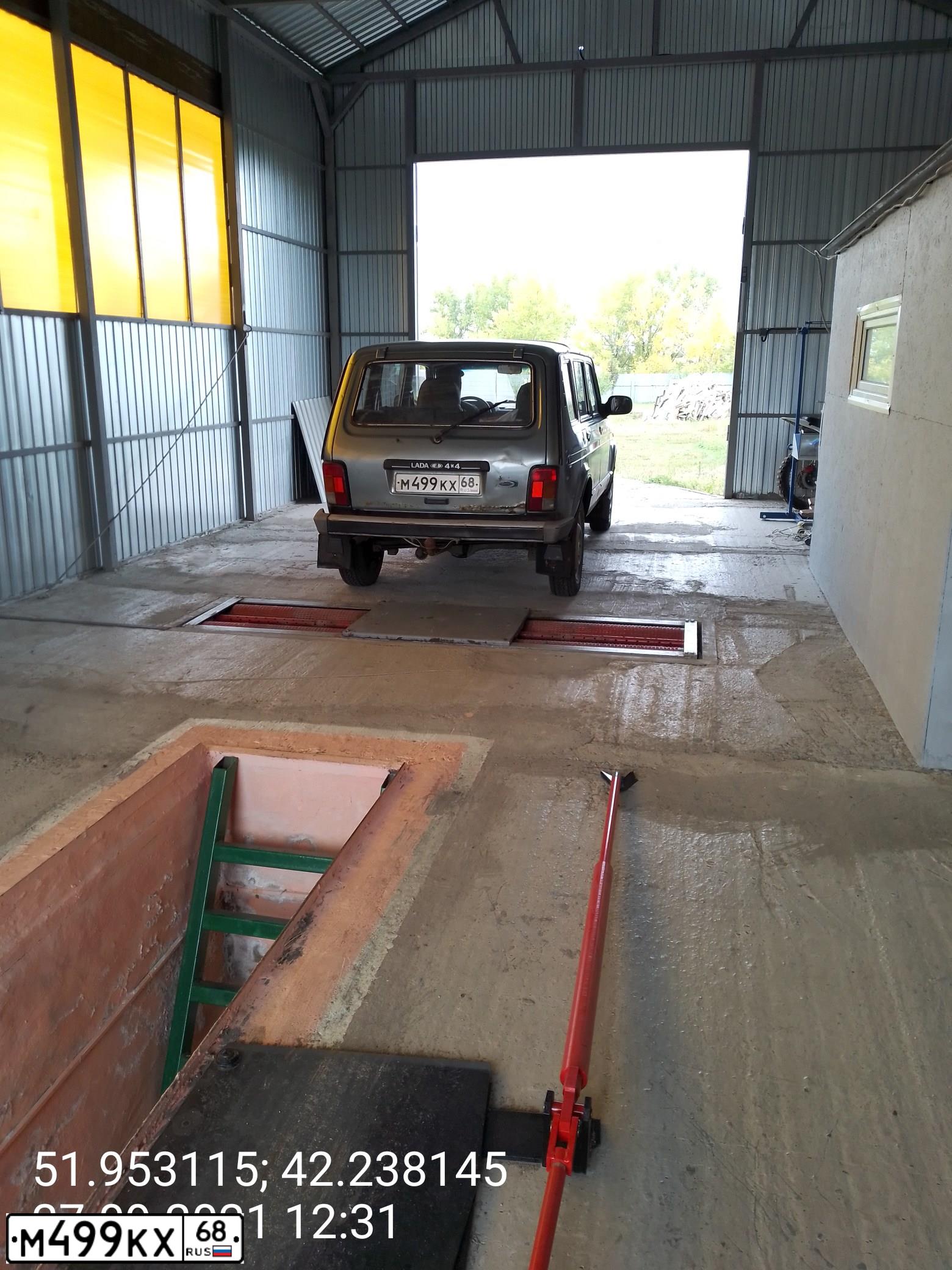 Фото автомобиля LADA 2131 NIVA, 2010 — госномер М499КХ68. Цвет: СРЕДНИЙ СЕРО-ЗЕЛЕНЫЙ МЕТ.
