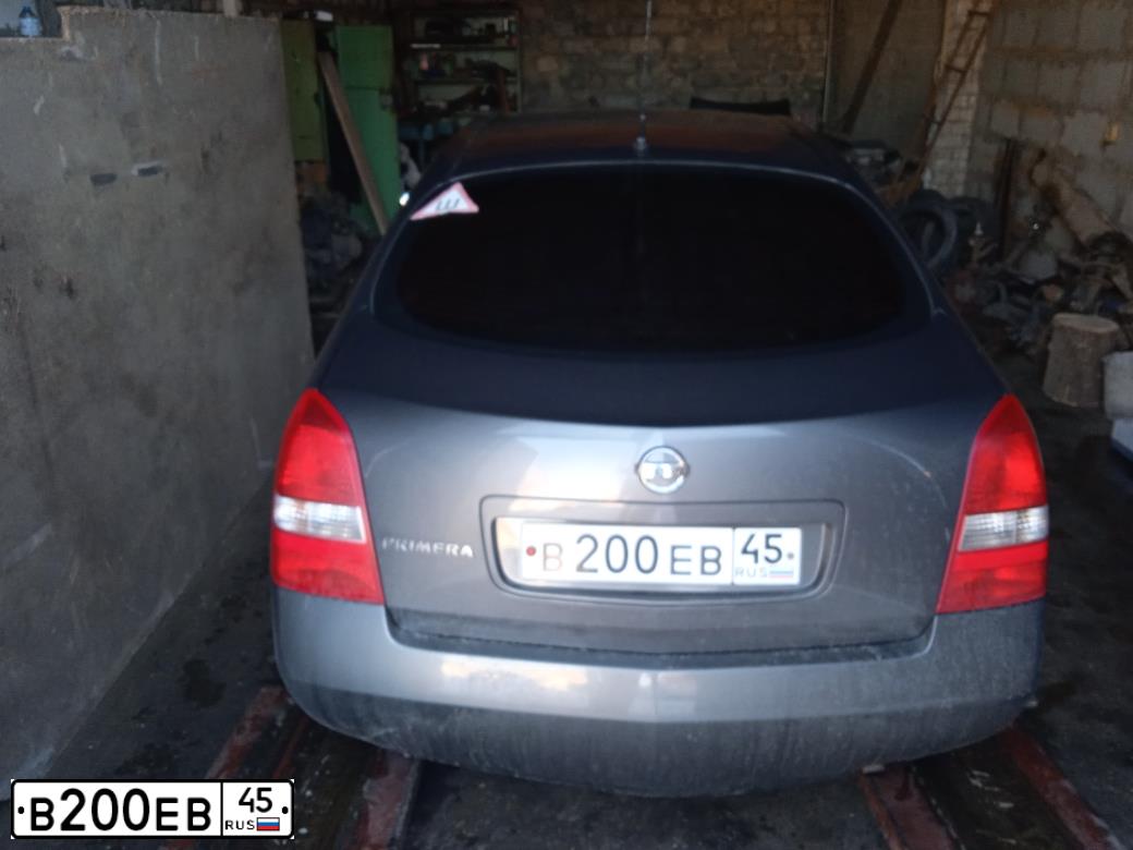 Фото автомобиля NISSAN PRIMERA, 2005 — госномер В200ЕВ45. Цвет: СЕРЫЙ