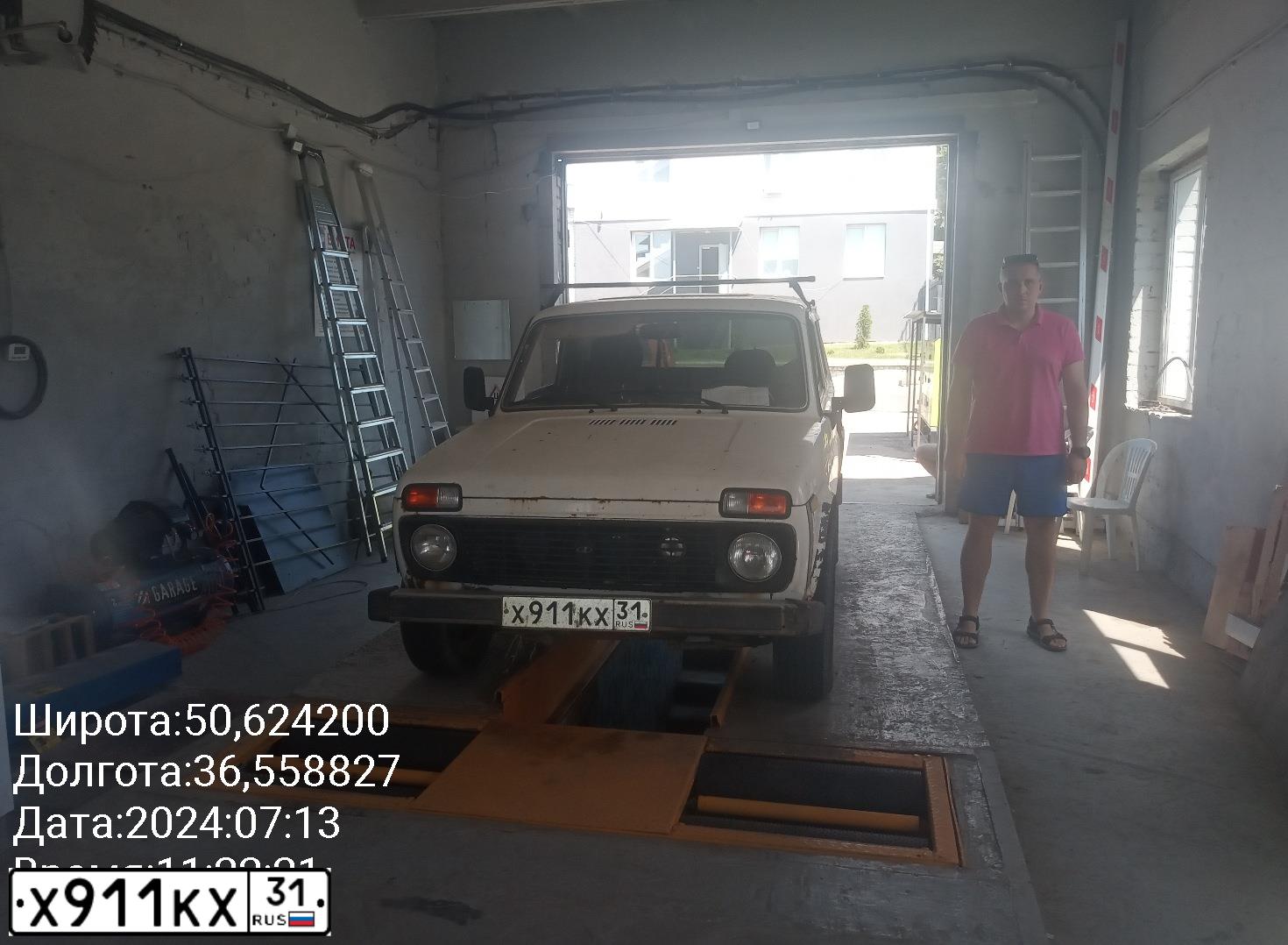 Фото автомобиля LADA 2121 NIVA, 1999 — госномер Х911КХ31. Цвет: БЕЛО-ЖЕЛТЫЙ