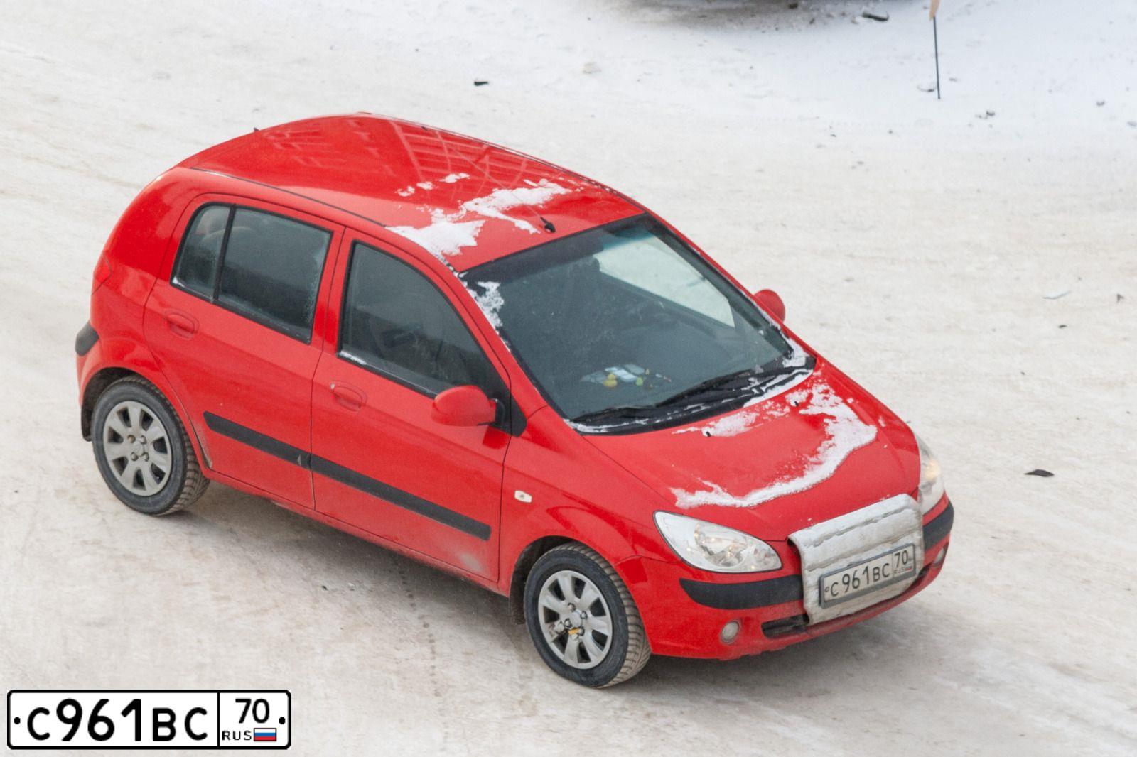 Фото автомобиля HYUNDAI GETZ, 2007 — госномер С961ВС70. Цвет: Красный