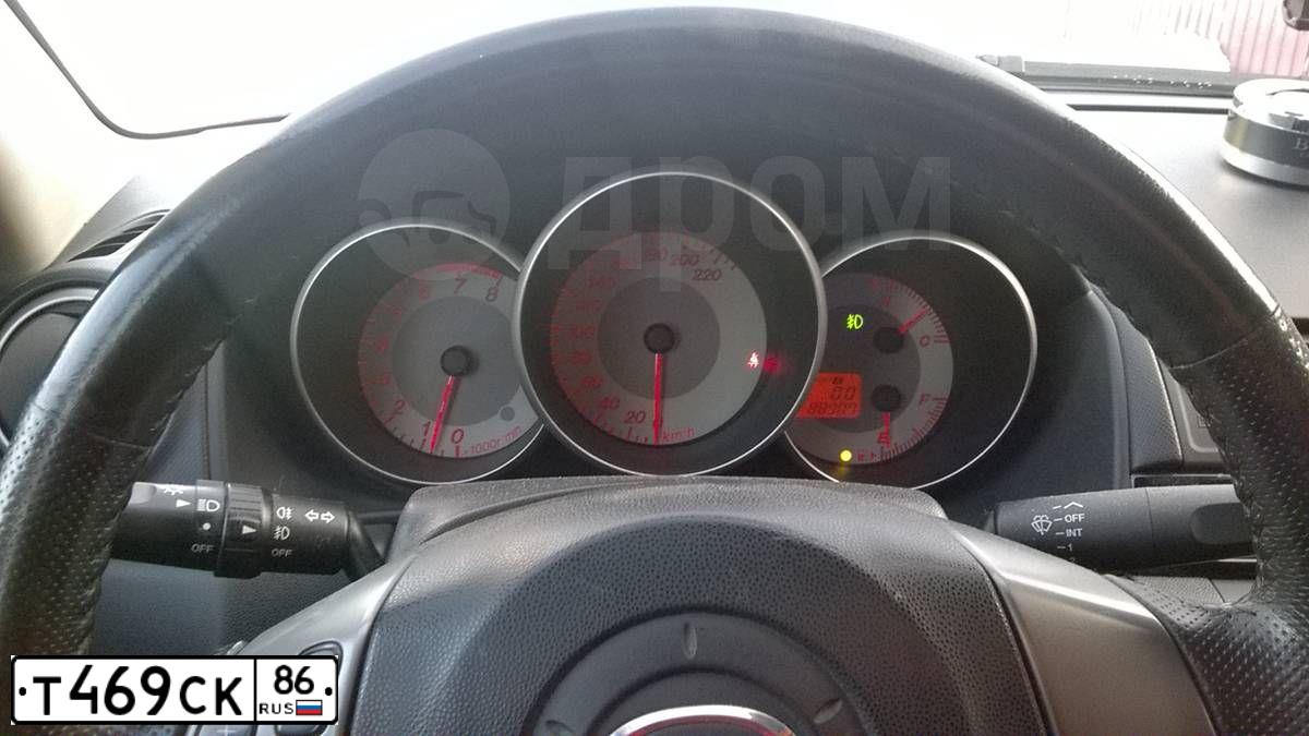 Фото автомобиля MAZDA 3, 2007 — госномер Е887ОР186. Цвет: Красный