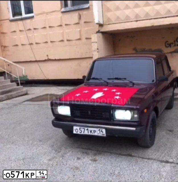 Фото автомобиля LADA 2107 LADA, 2007 — госномер О571КР14. Цвет: ТЕМНО-ВИШНЕВЫЙ