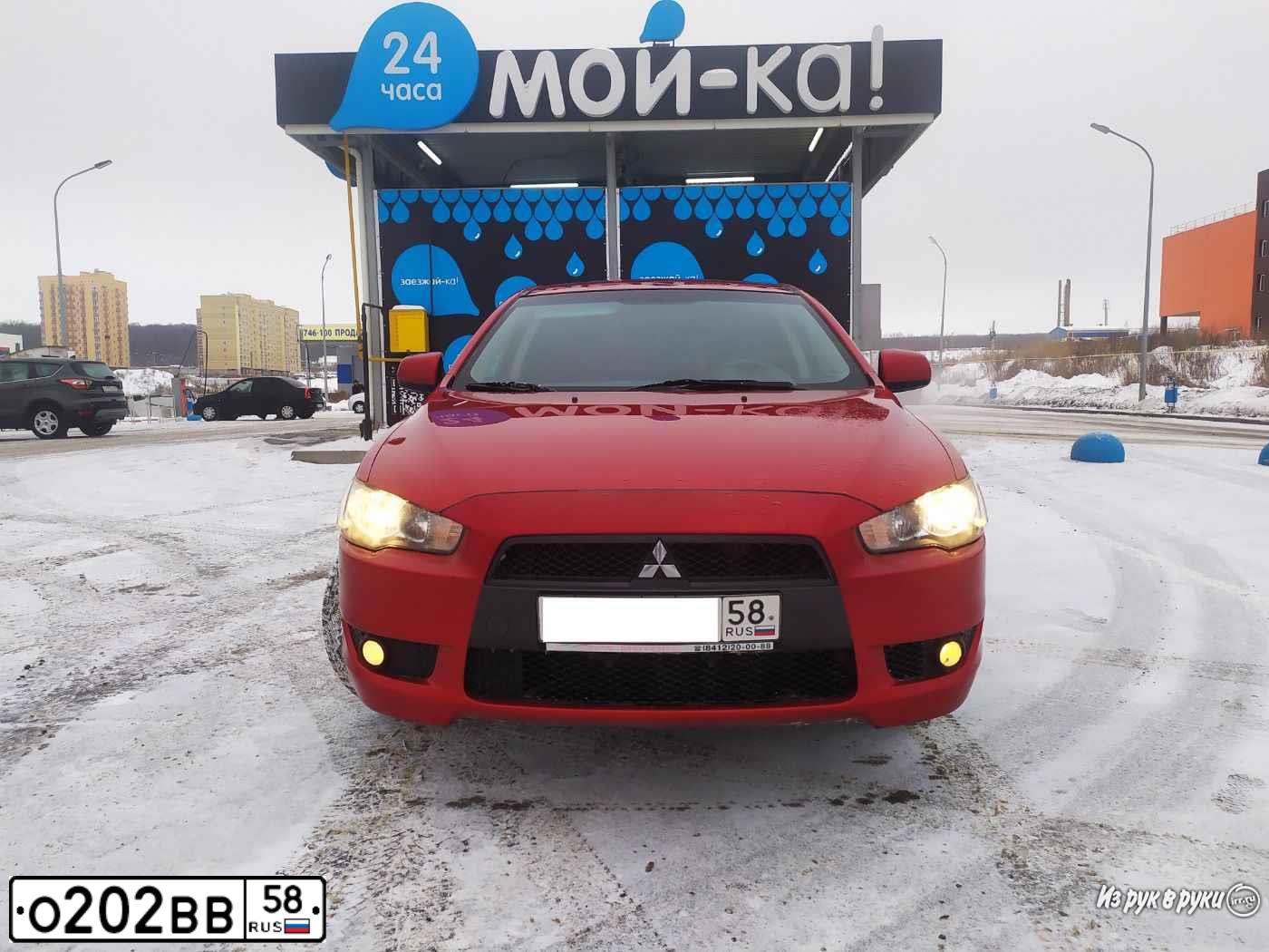 Фото автомобиля MITSUBISHI LANCER, 2008 — госномер О202ВВ58. Цвет: Красный
