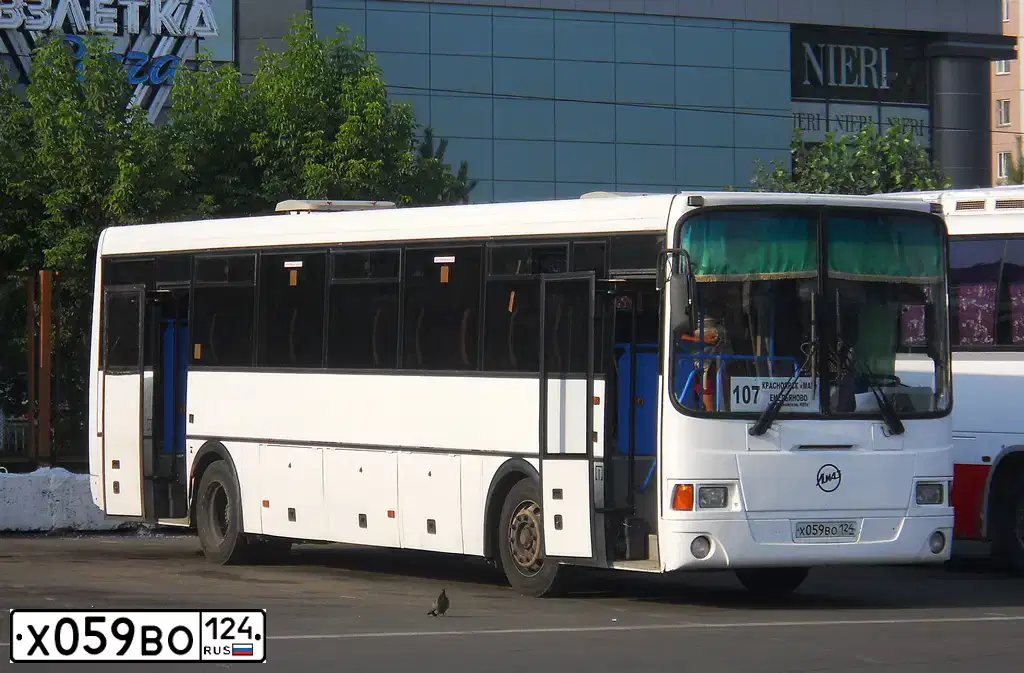 Фото автомобиля LIAZ 5256, 2010 — госномер Х059ВО124. Цвет: Белый