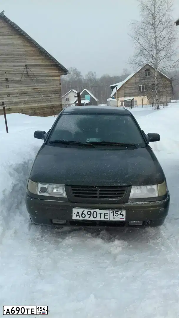 Фото автомобиля LADA 2112, 2004 — госномер А690ТЕ154. Цвет: ЗОЛОТИСТЫЙ ТЕМНО-ЗЕЛЕНЫЙ