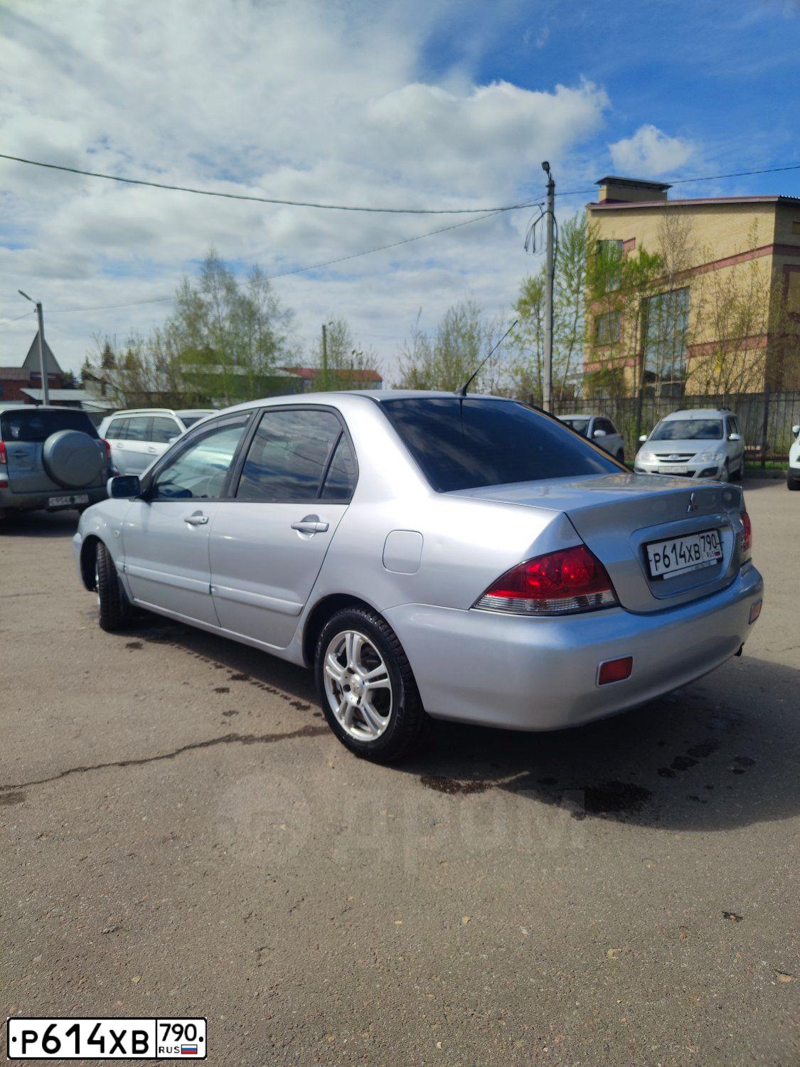 Фото автомобиля MITSUBISHI LANCER, 2007 — госномер Х919АЕ199. Цвет: Серебристый