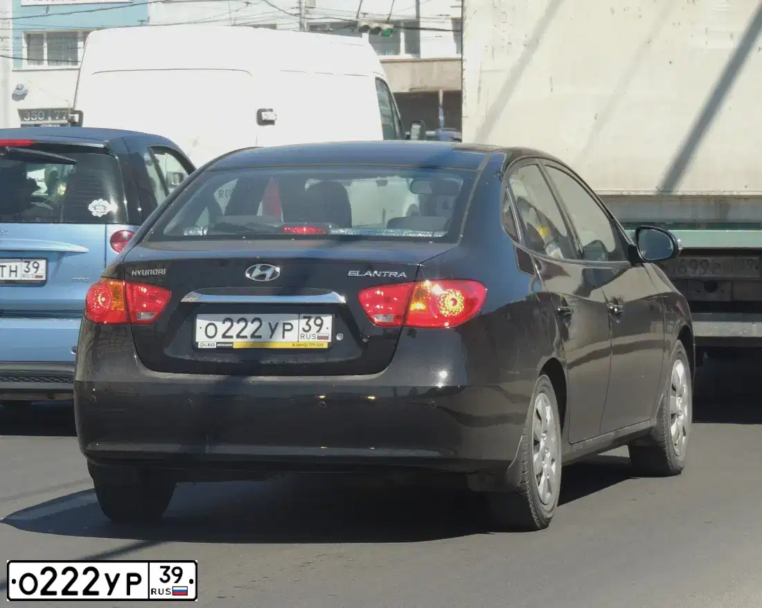 Фото автомобиля HYUNDAI ELANTRA, 2010 — госномер О222УР39. Цвет: ЧЕРНЫЙ