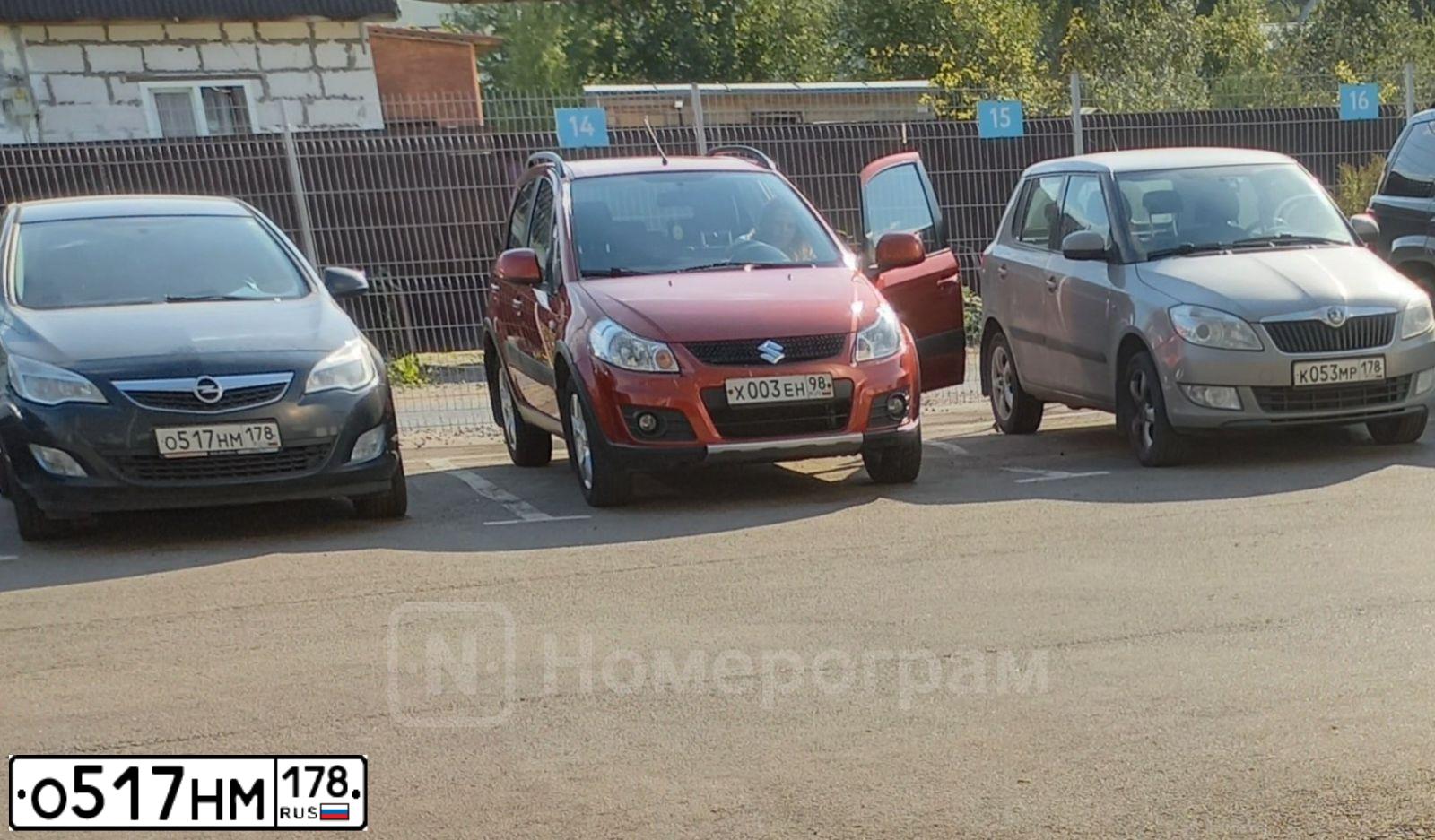 Фото автомобиля OPEL ASTRA, 2011 — госномер О517НМ178. Цвет: ЧЕРНЫЙ МЕТАЛЛИК