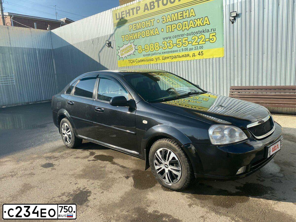 Фото автомобиля CHEVROLET LACETTI, 2006 — госномер Р108ВТ150. Цвет: ЧЕРНЫЙ