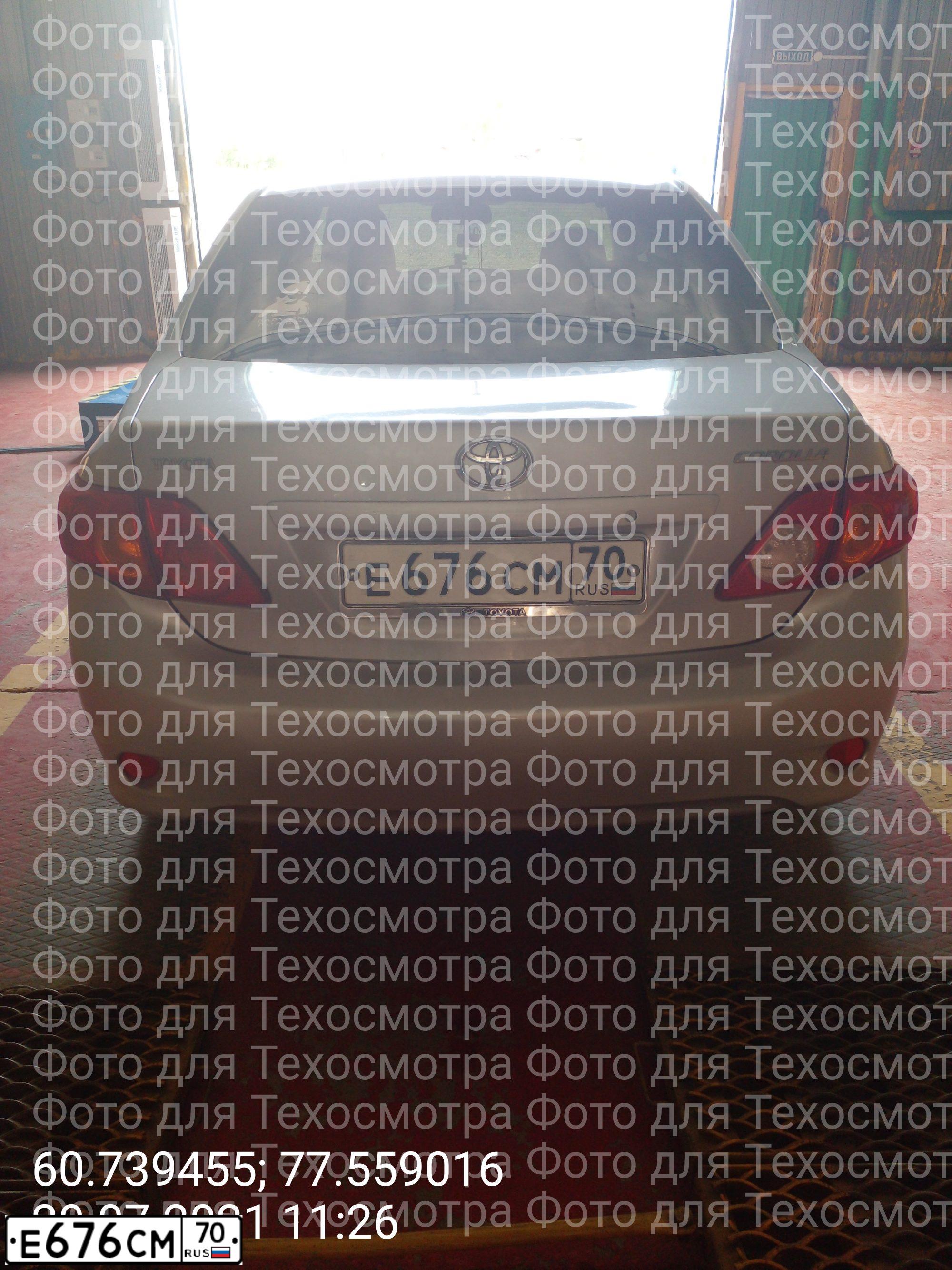 Фото автомобиля TOYOTA COROLLA, 2007 — госномер Е676СМ70. Цвет: Серебристый
