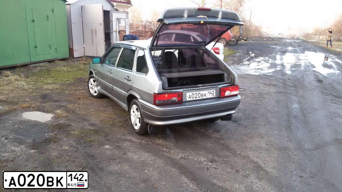 Фото автомобиля LADA 2172 PRIORA, 2010 — госномер Н768АС70. Цвет: СЕРО-ЗЕЛЕНЫЙ