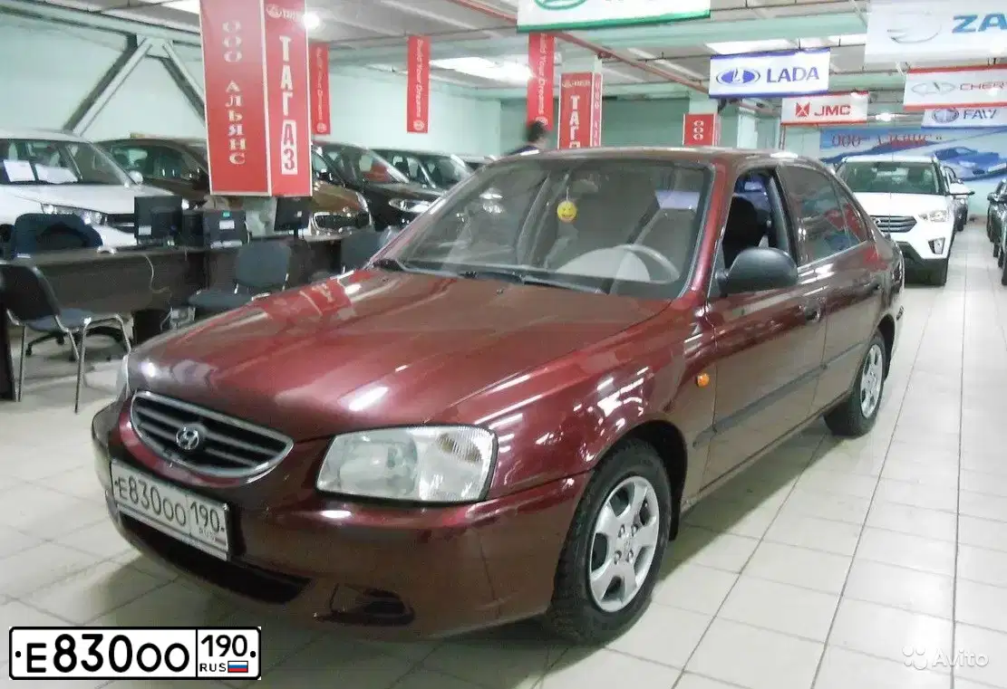 Фото автомобиля TAGAZ ACCENT, 2011 — госномер Е830ОО190. Цвет: Красный
