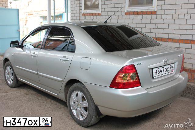 Фото автомобиля TOYOTA COROLLA, 2005 — госномер Е868ХА98. Цвет: СЕРЕБРИСТЫЙ