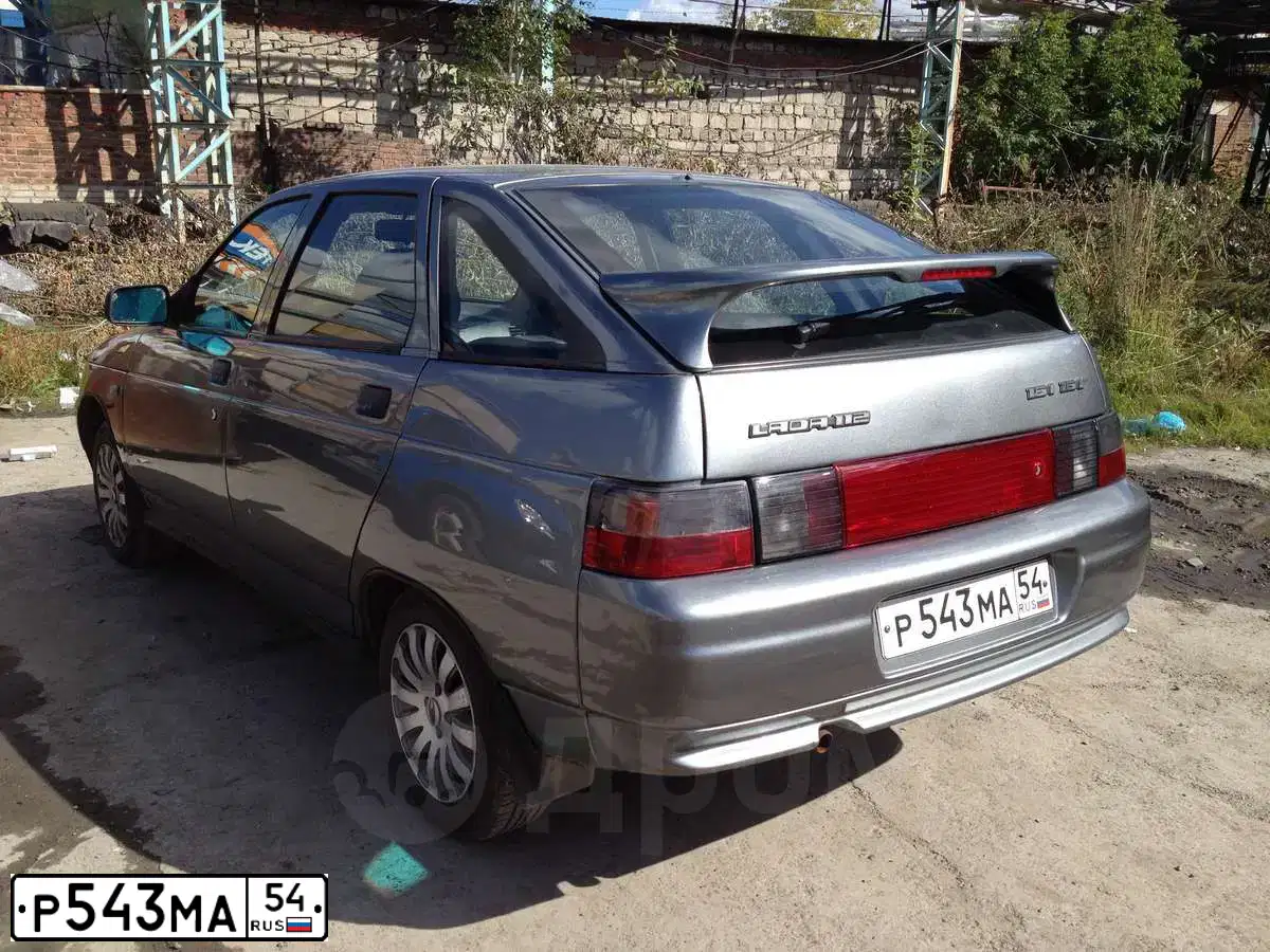 Фото автомобиля LADA 2112, 2005 — госномер Р543МА54. Цвет: СРЕДНИЙ СЕРО-ЗЕЛЕН МЕТ