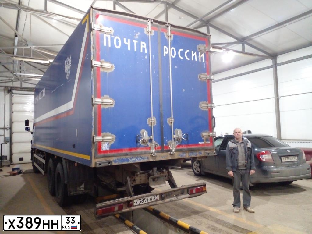 Фото автомобиля KAMAZ 65117 /6X4/, 2015 — госномер Х389НН33. Цвет: По ост. 45.60-2001 сх. А12