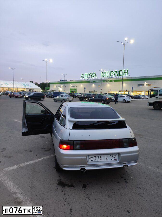 Фото автомобиля LADA 2112, 2007 — госномер М521ОВ13. Цвет: СВЕТЛО-СЕРЫЙ