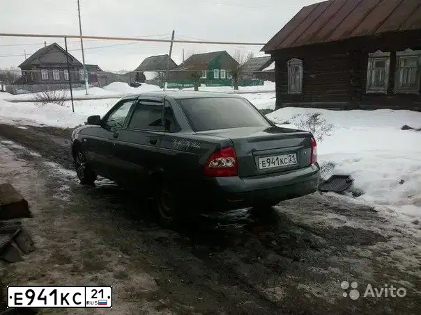 Фото автомобиля LADA 21103, 2011 — госномер Е941КС21