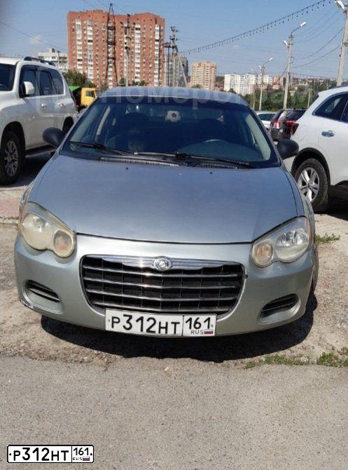 Фото автомобиля CHRYSLER SEBRING, 2004 — госномер Р312НТ161. Цвет: СЕРО-ЗЕЛЕНЫЙ