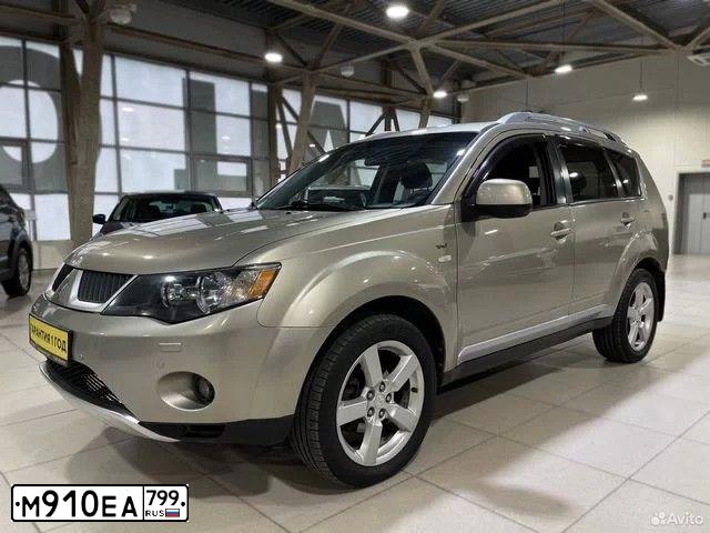Фото автомобиля MITSUBISHI OUTLANDER, 2008 — госномер Н717ЕТ70. Цвет: БЕЖЕВЫЙ