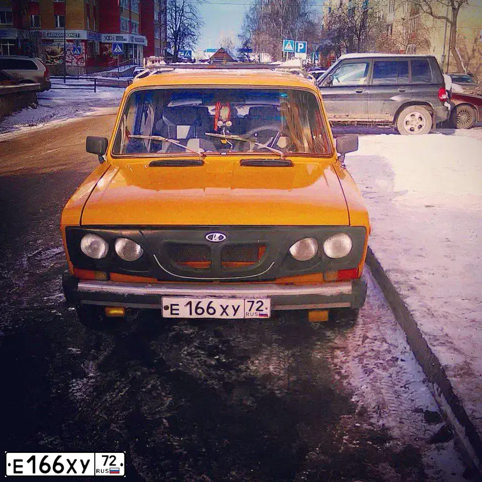 Фото автомобиля LADA 2106, 1982 — госномер Е166ХУ72. Цвет: ЖЕЛТЫЙ