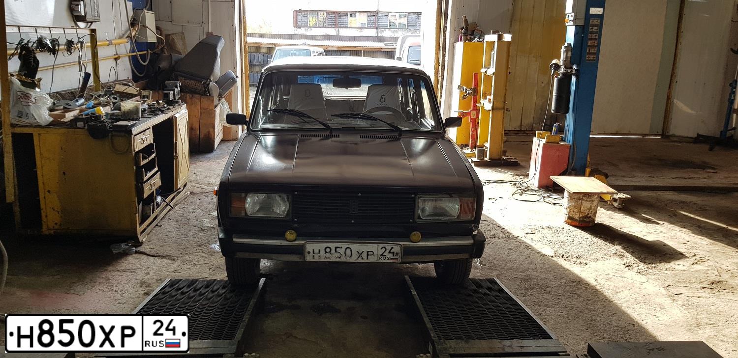 Фото автомобиля LADA 2104, 1997 — госномер Н850ХР24. Цвет: ФИОЛЕТОВЫЙ