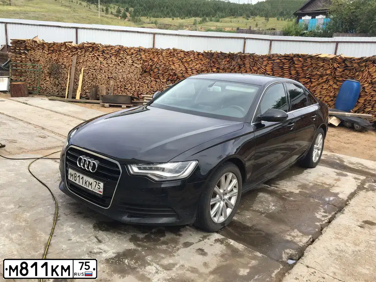 Фото автомобиля AUDI A6, 2013 — госномер Х646НО138. Цвет: ЧЕРНЫЙ