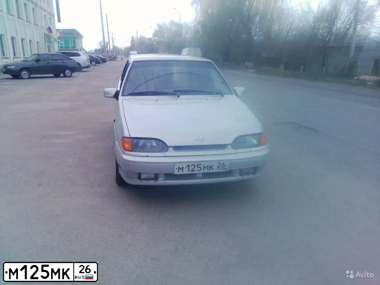 Фото автомобиля LADA 2114 SAMARA, 2006 — госномер М125МК26. Цвет: МОЛОЧНО-БЕЛЫЙ СЕРЕБРИСТЫЙ
