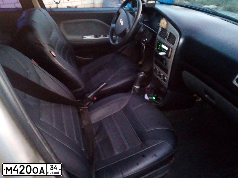 Фото автомобиля CHERY AMULET /FLAGCLOUD/, 2008 — госномер М420ОА34. Цвет: Серый