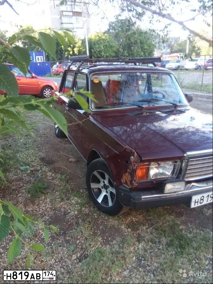 Фото автомобиля LADA 2107 LADA, 2007 — госномер Н819АВ174. Цвет: ТЕМНО-ВИШНЕВЫЙ