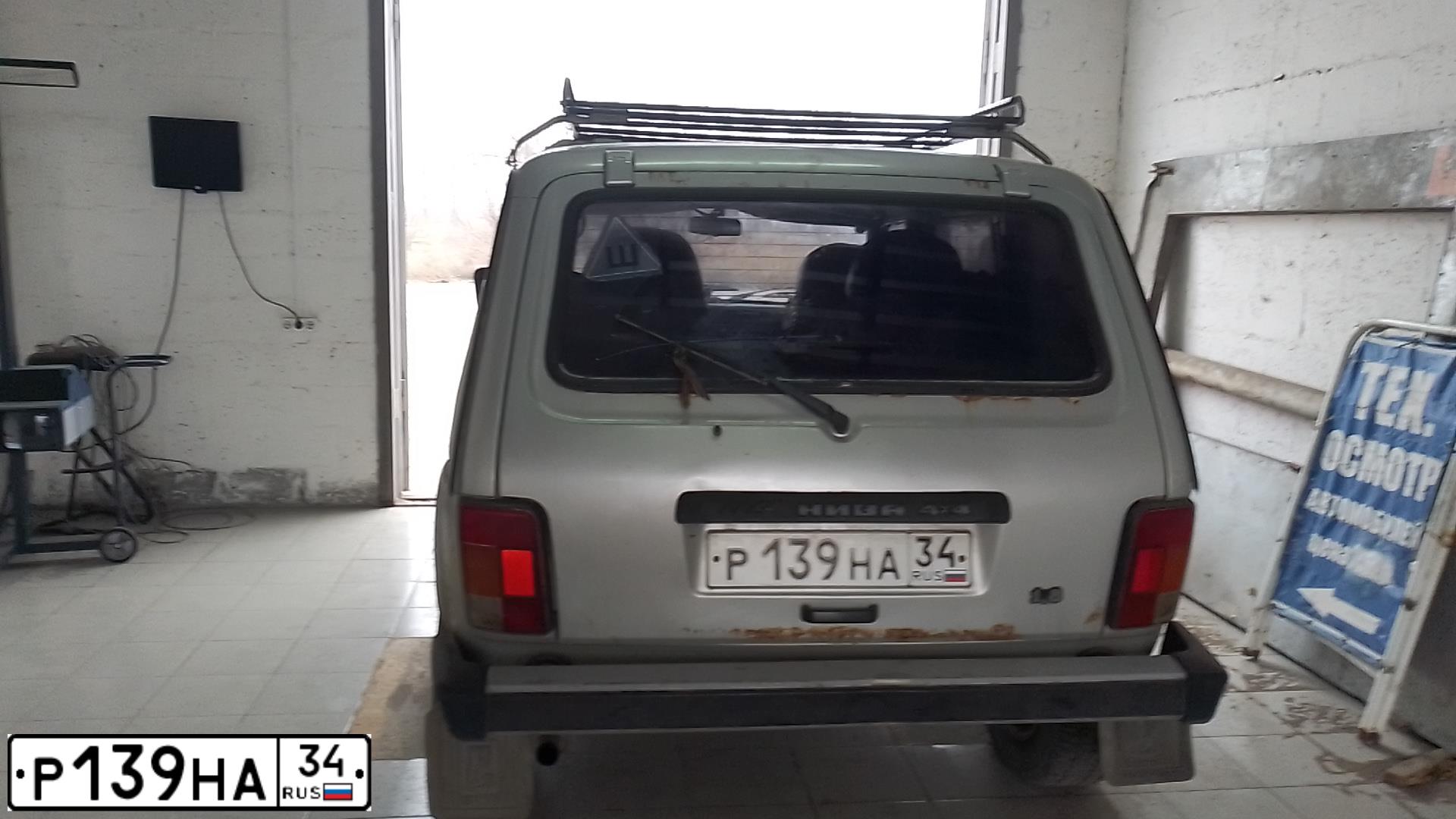 Фото автомобиля LADA 2131 NIVA, 2004 — госномер К325РТ34. Цвет: БЕЛЫЙ СЕРЕБРИСТЫЙ