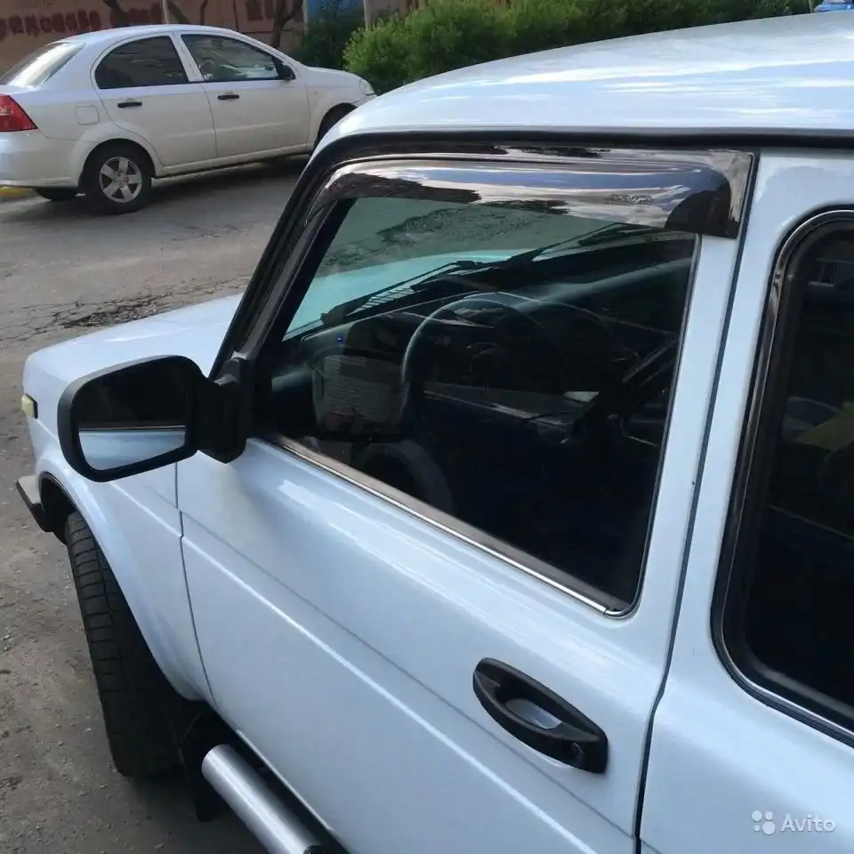 Фото автомобиля LADA 2121 NIVA, 2013 — госномер М033АС136. Цвет: ЯРКО-БЕЛЫЙ